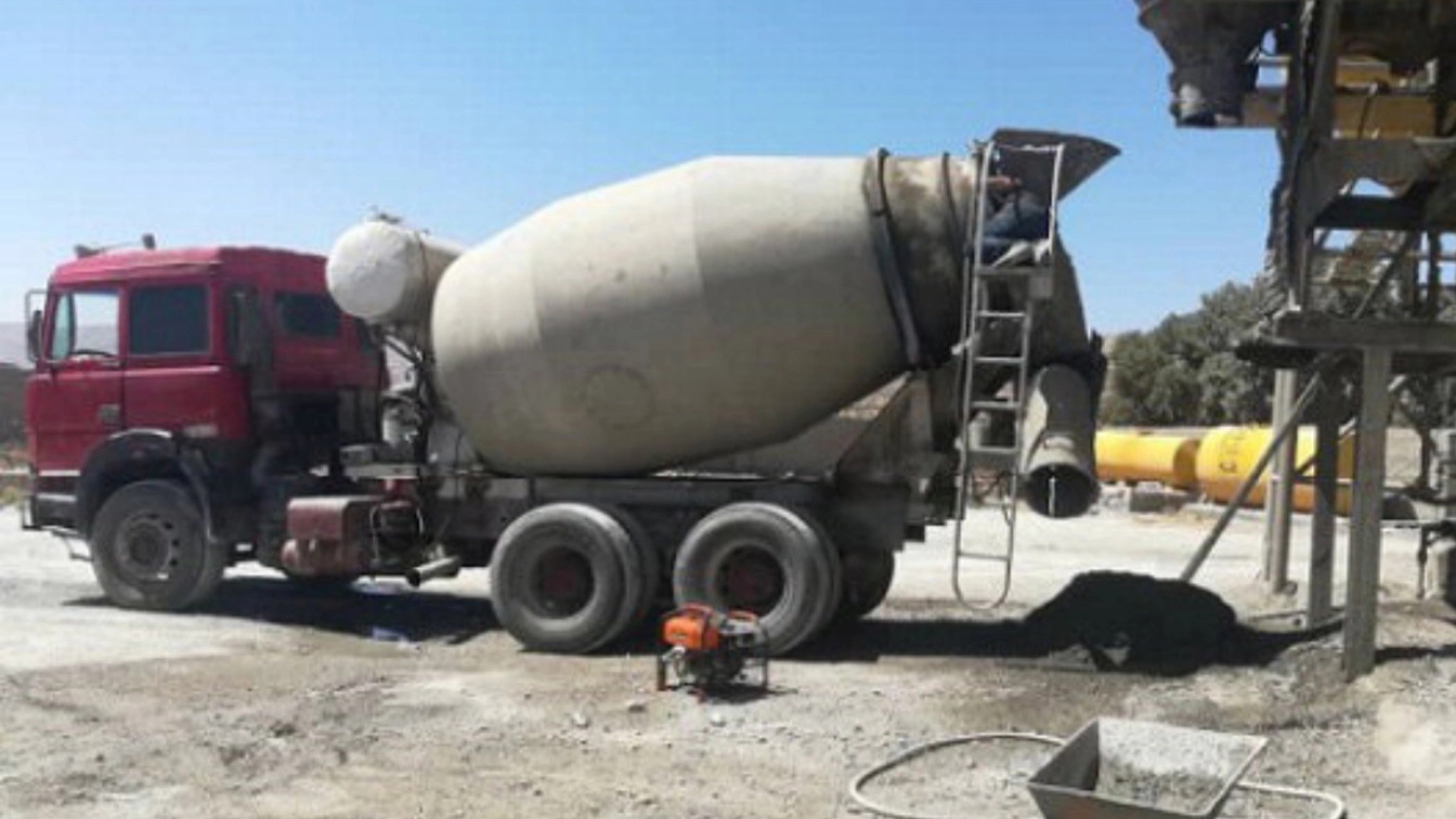 What are the components of a concrete mixer truck?